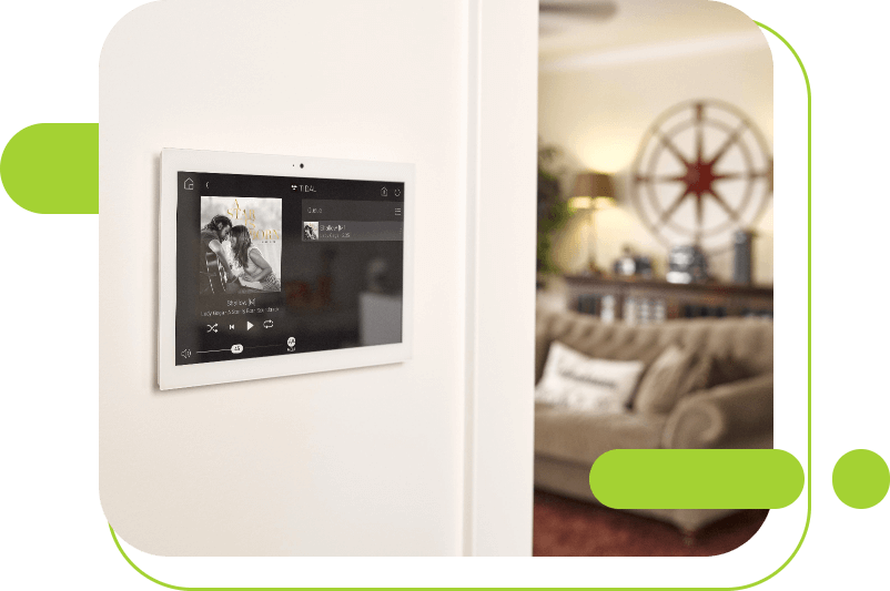 tablet on wall show spotify open with a song playing throughout the home