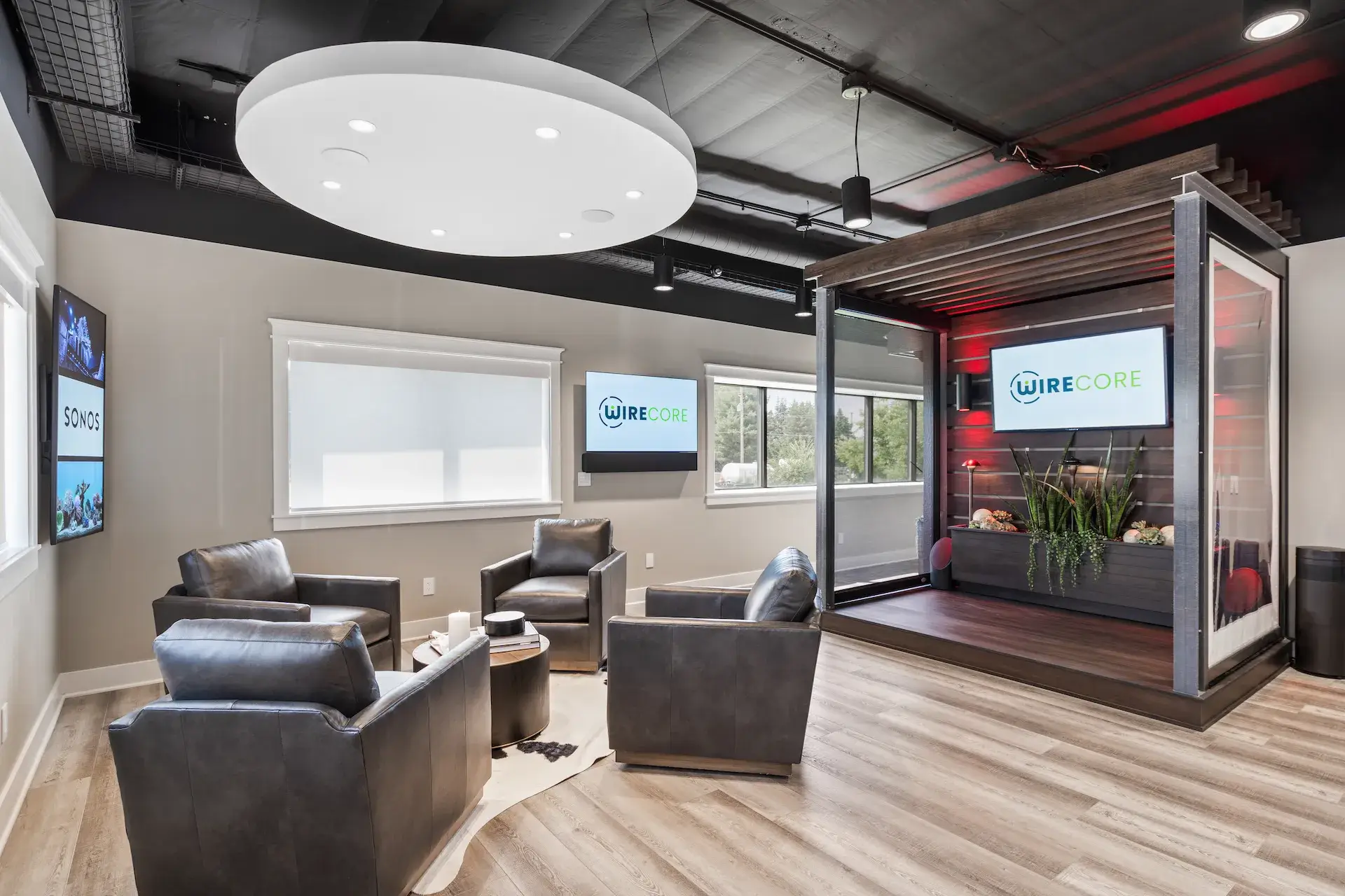 interior of showroom setup with digital displays